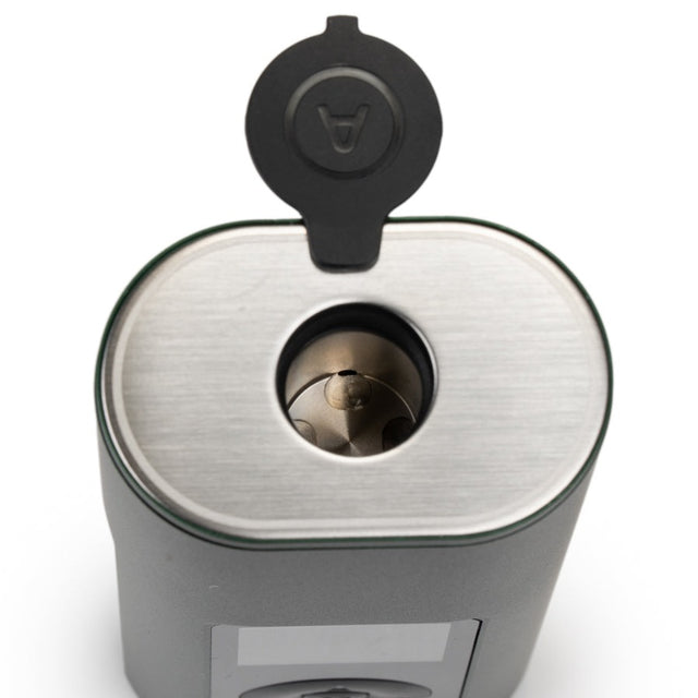 Top of the Arizer Solo 3 with the stem cap open, showing the heating chamber where the stem goes in